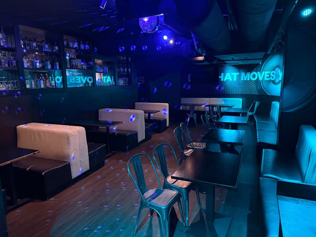 Nightclub lounge with blue lighting